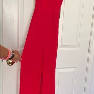 Lulu's Red Sleeveless Jumpsuit with Fitted Silhouette
